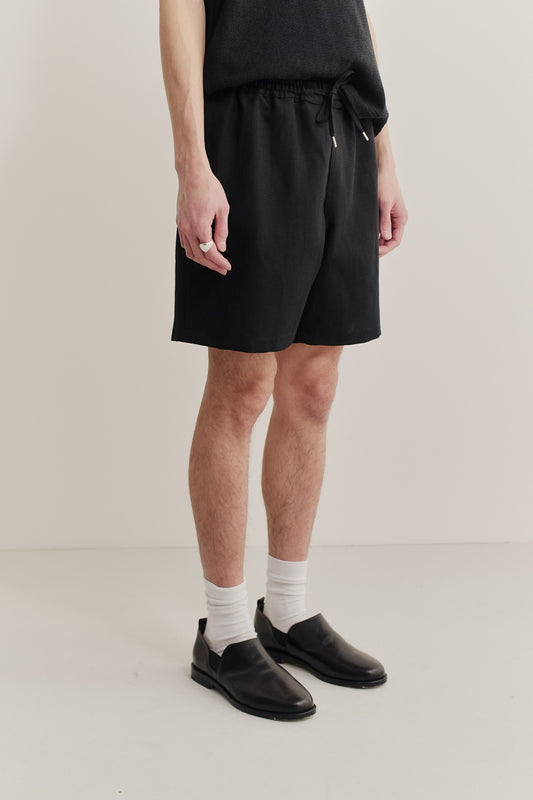 Men's shorts, black cotton blend, pre-washed with wavy stripes, adjustable waistband.