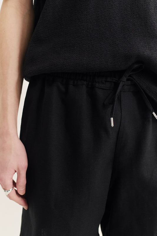 Men's shorts, black cotton-viscose blend, pre-washed with irregular wavy stripes, elastic waist, pull cords.