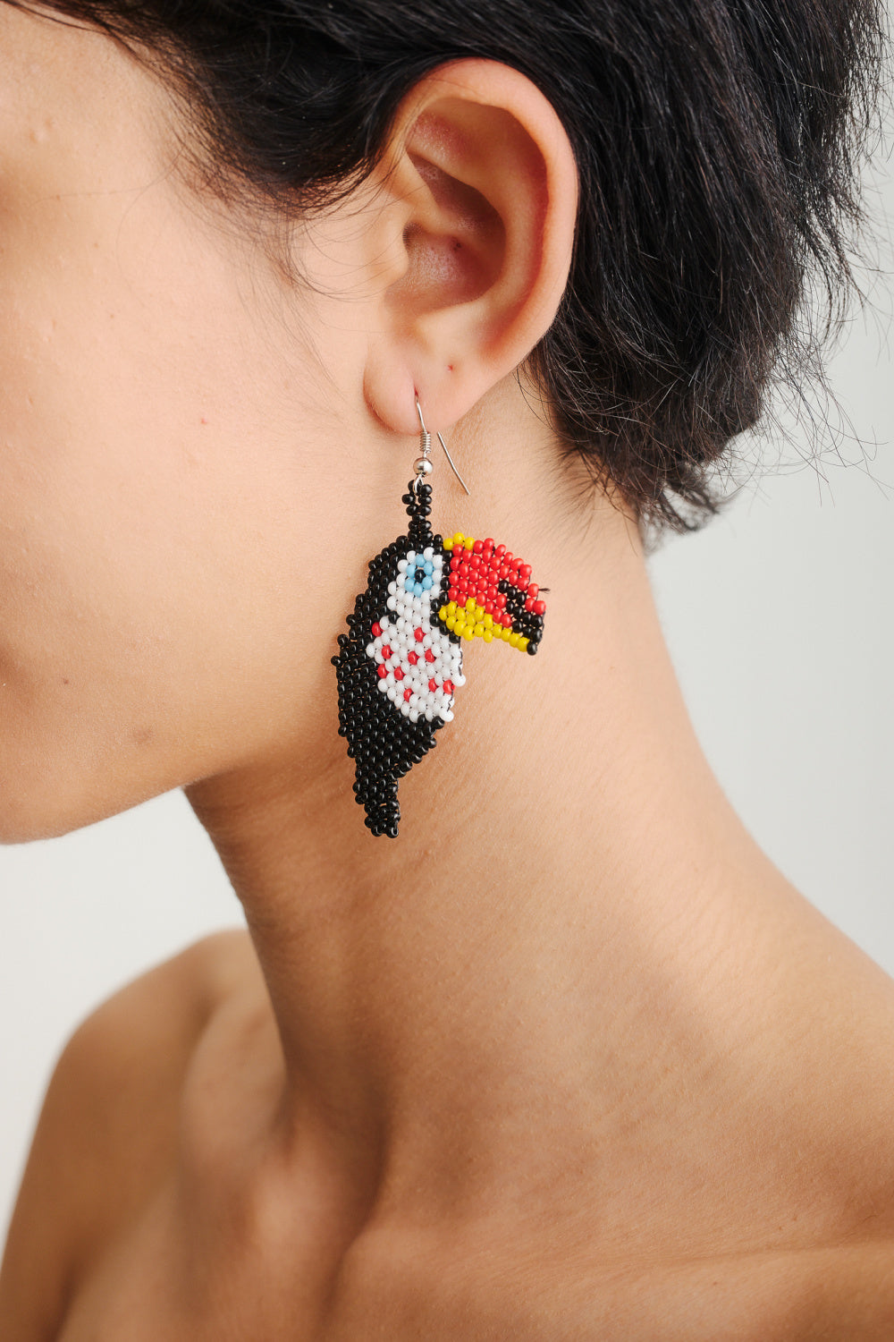 EMBERA TUCAN EARRINGS