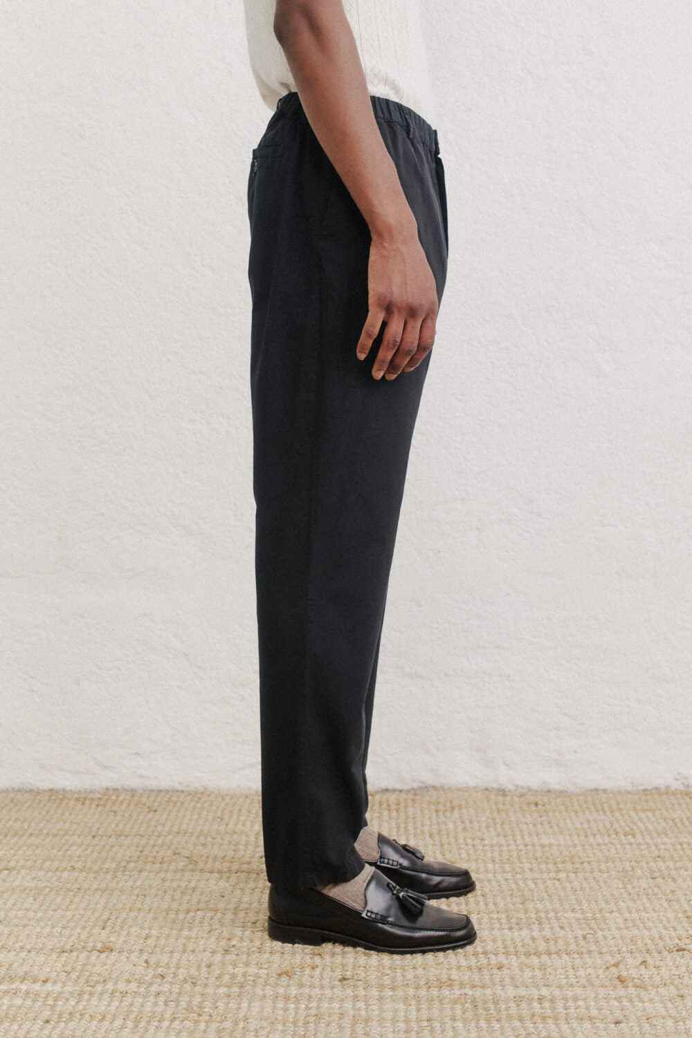 ELASTICATED WIDE TROUSERS